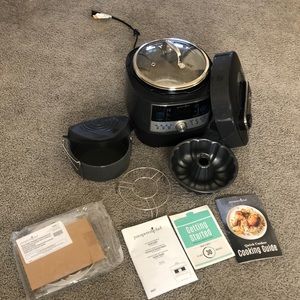 Pampered Chef Quick Cooker and cook book